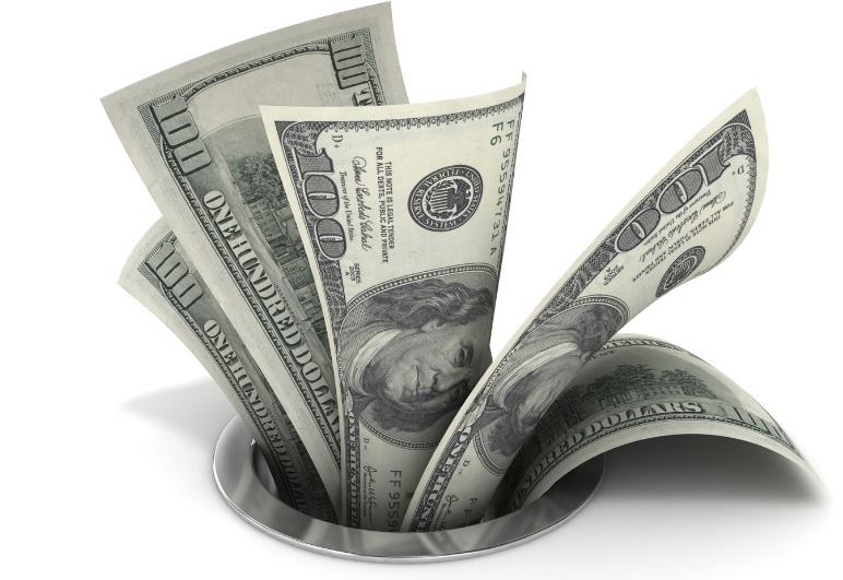 A stack of $100 bills swirling into a drain, symbolizing financial leaks that deplete net worth over time.